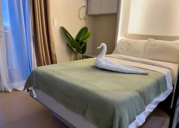 アパートホテル Sunset View In Venice Grand Canal Mall Suite, Pet Friendly, Walking Distance To Venice Mall, 5 Mins Away To Bgc 4*